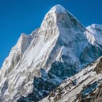 Techniques for navigating steep terrain while mountain biking
